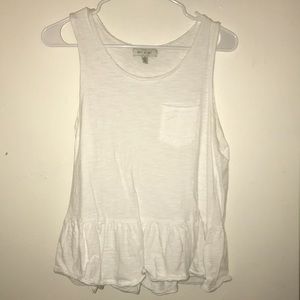White Anthropologie tank top with ruffled base